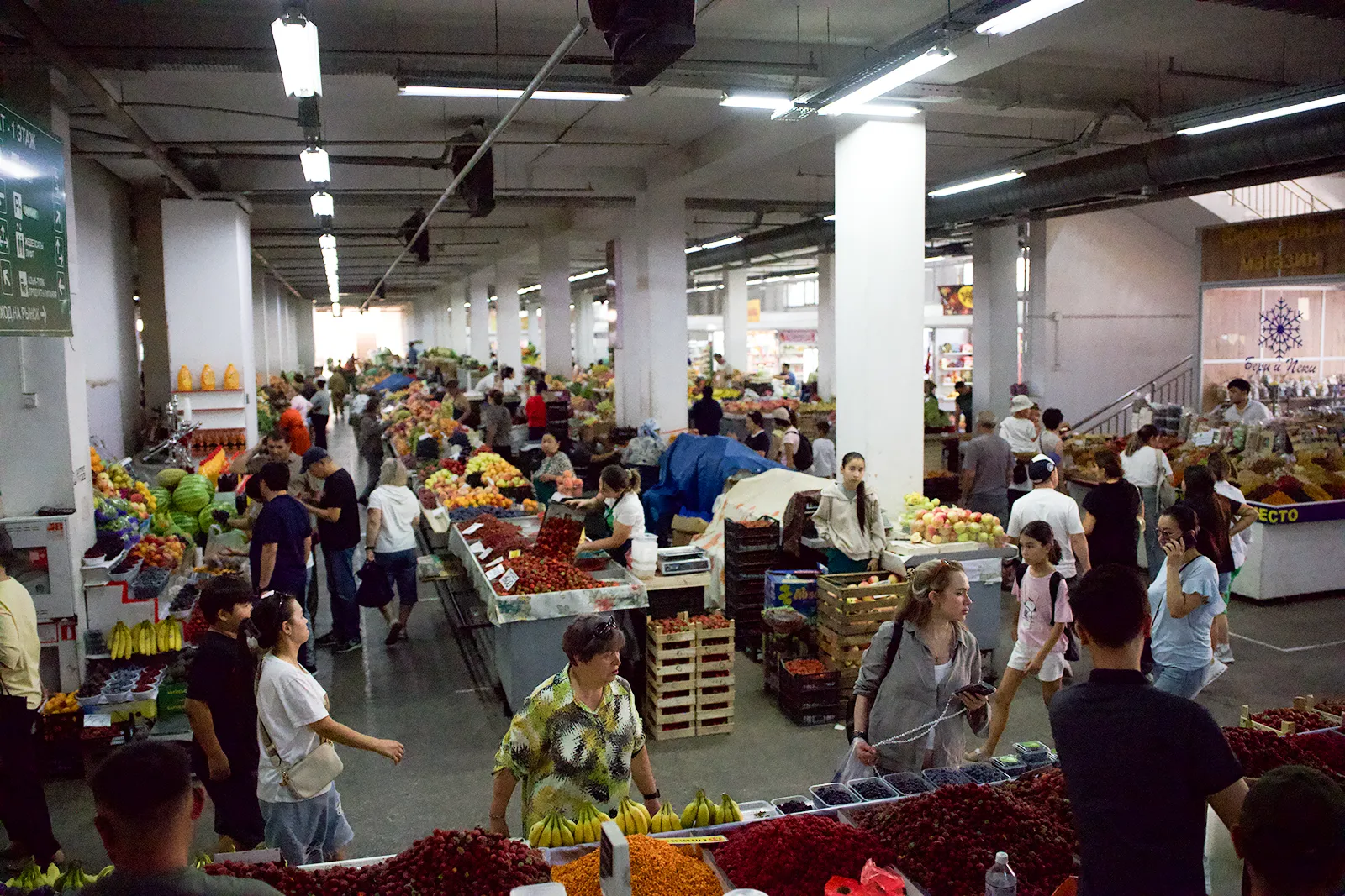 Vendors inside Green Bazaar in Almaty