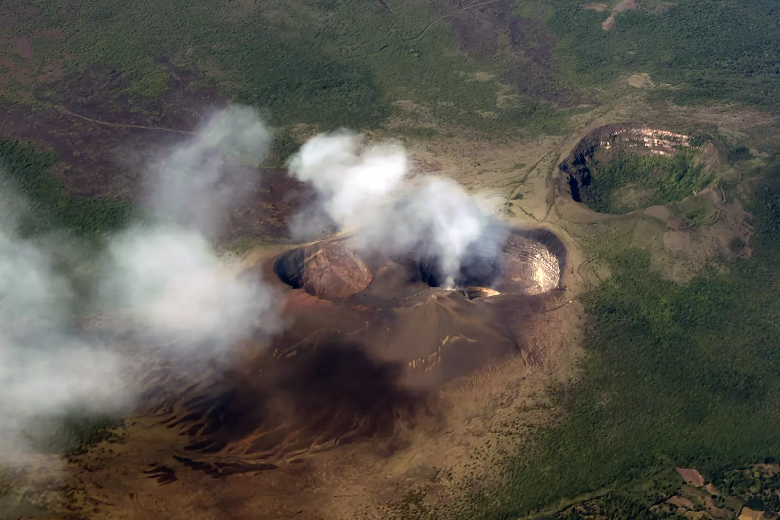 Flying to the United States without Samantha while passing over Masaya Volcano