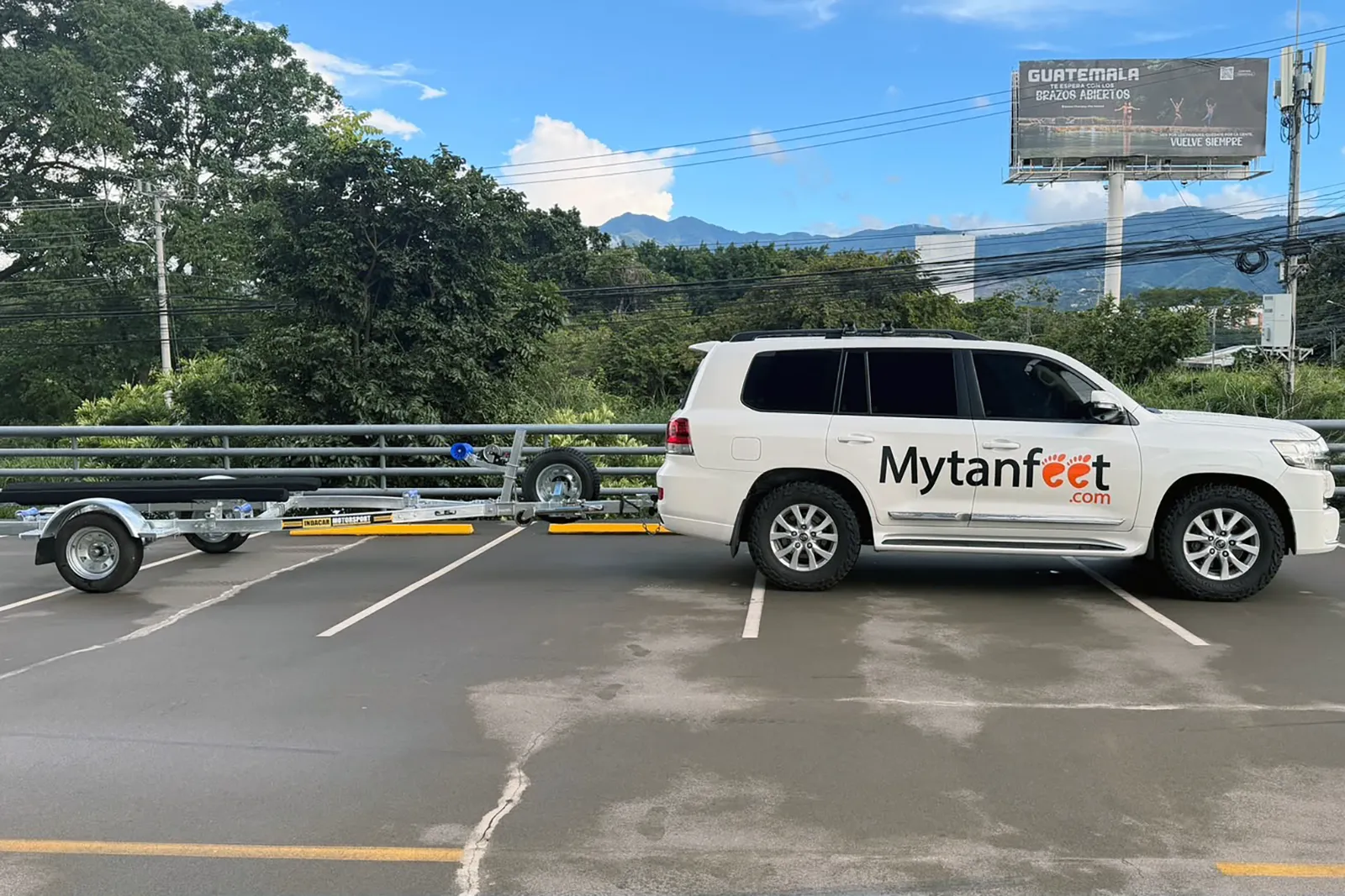 Mytanfeet L200 towing the new larger trailer for the Sea Doo FishPro
