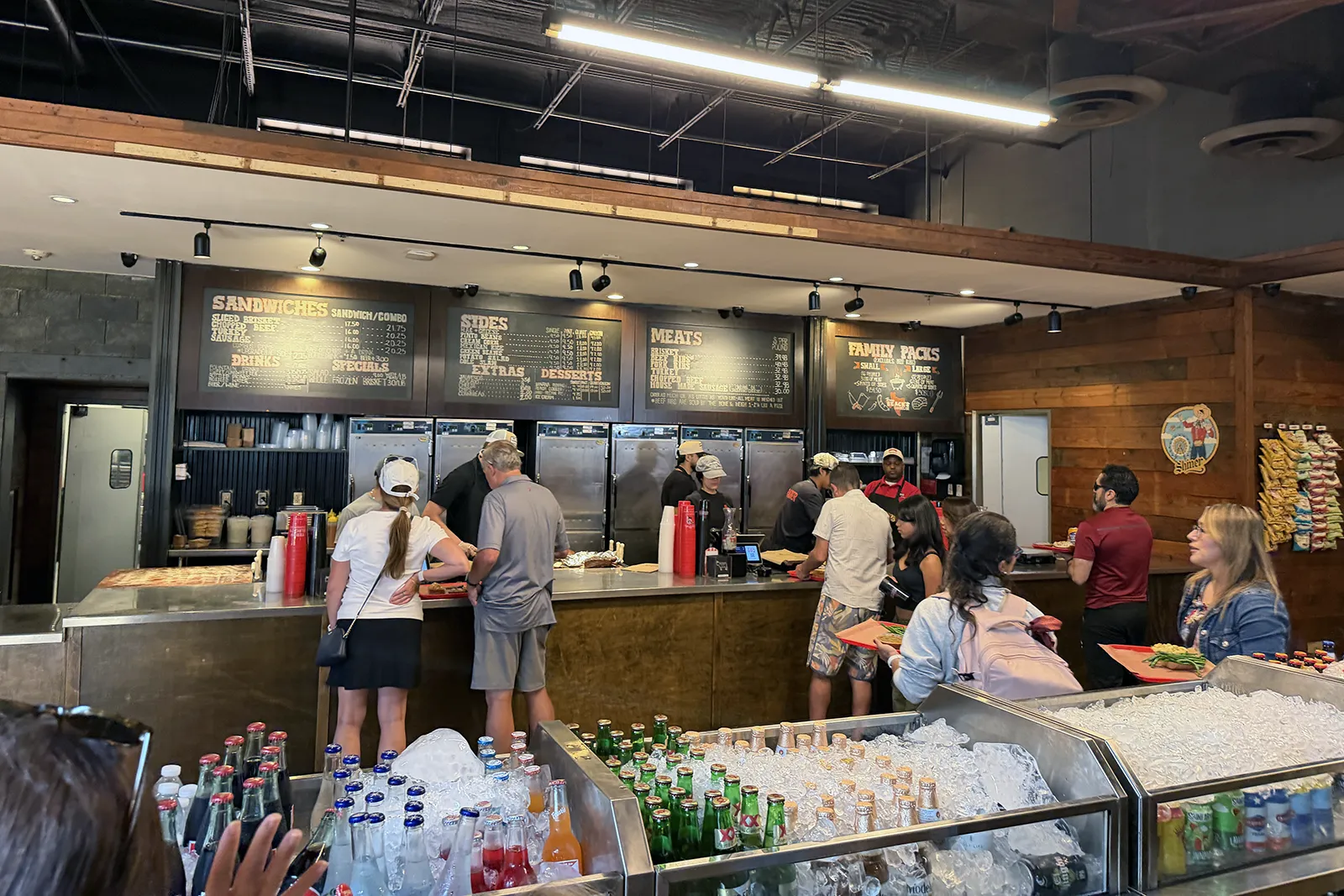 Beer and bottled drinks beside the ordering line at Terry Black’s