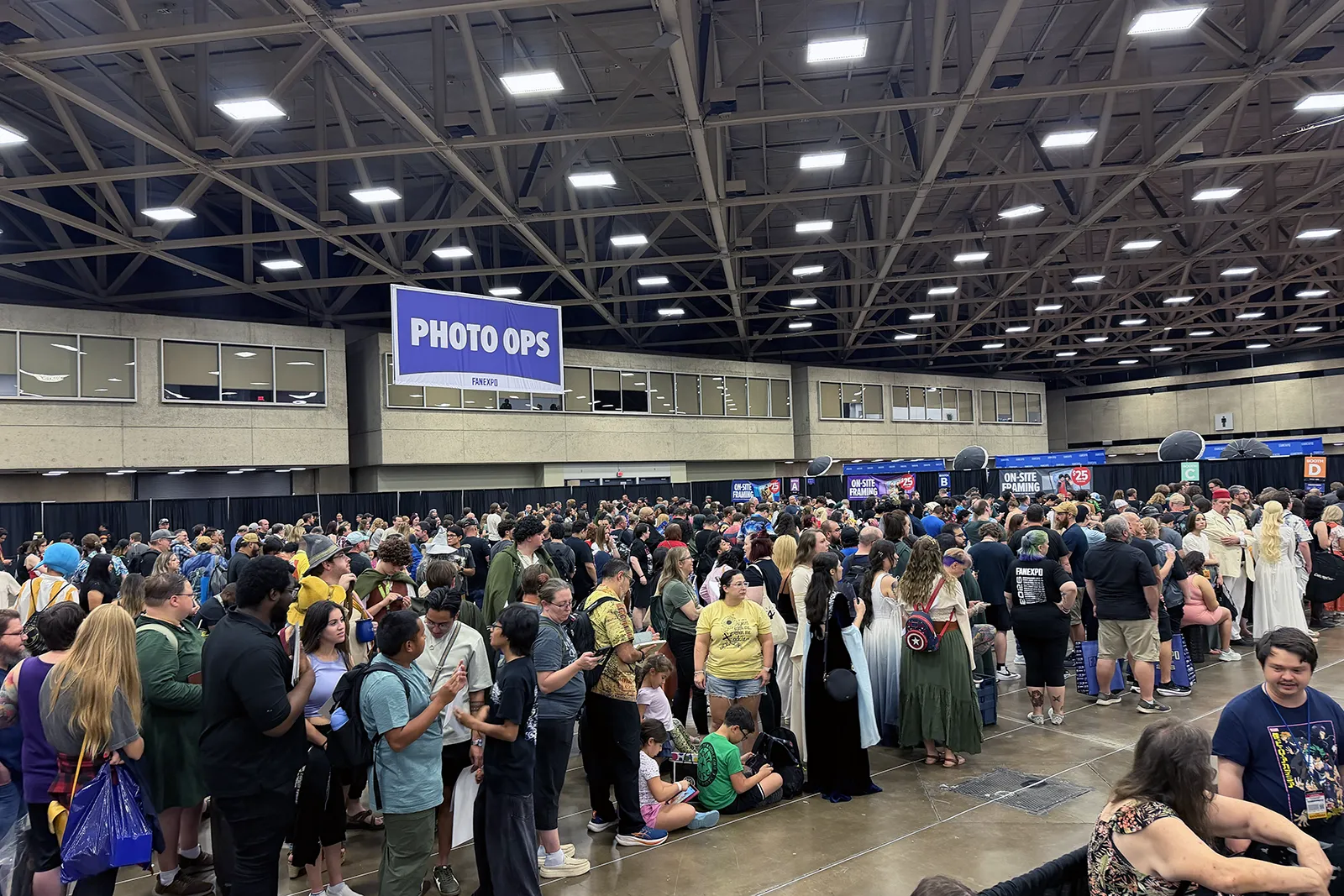 Fans waiting in the professional photo area at FAN EXPO Dallas